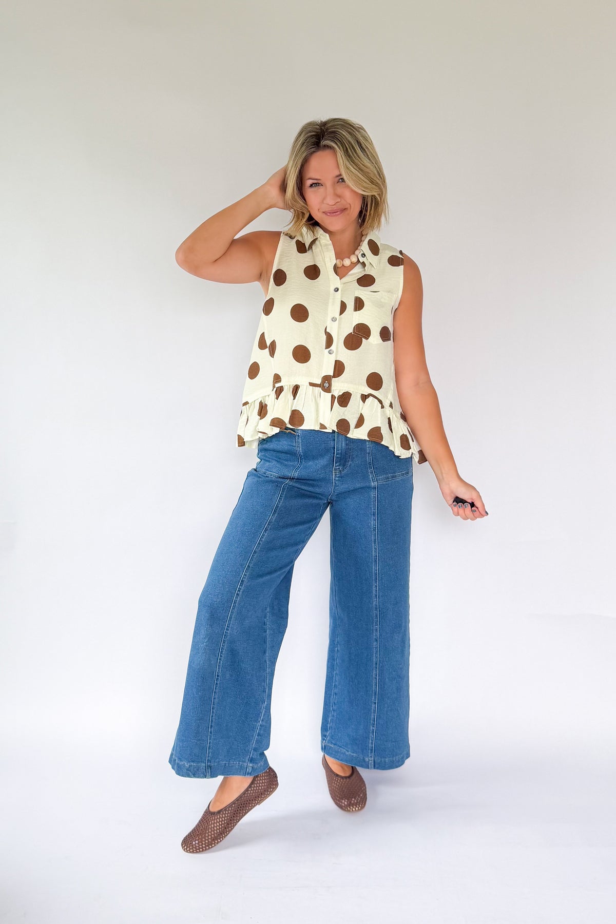 entro ivory top with brown polka dots