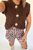 entro brown sleeveless sweater with gold buttons