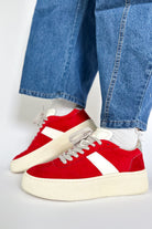 shu shop red sneakers