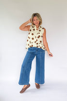 entro ivory top with brown polka dots